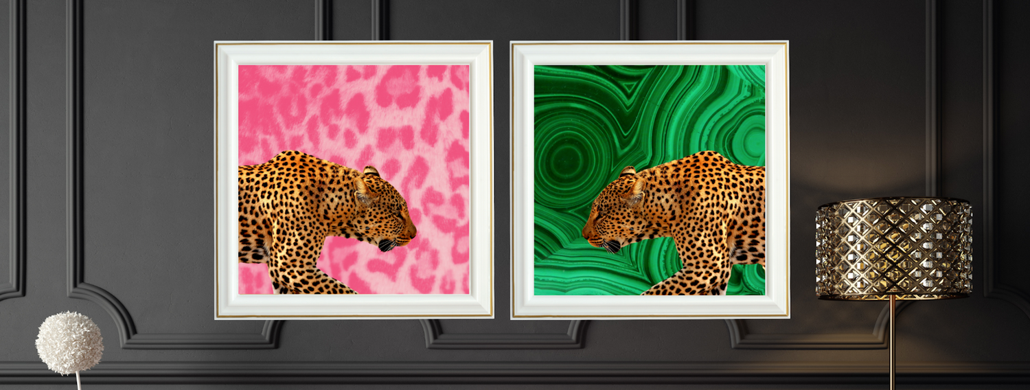 Image shows two framed prints on a dark grey wall, pink leopard print and green malachite print both with prowling leopards